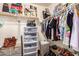 Organized walk-in closet featuring shelving, hanging rods, and storage drawers for maximum storage capacity at 3960 W Salter Dr, Glendale, AZ 85308