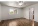 Bright bedroom with wood flooring and ample natural light at 4420 E Covina St, Mesa, AZ 85205