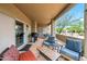 Charming covered patio with comfortable seating, perfect for enjoying outdoor leisure and relaxation at 4748 E Eden Dr, Cave Creek, AZ 85331