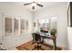 Bright home office with large windows, plantation shutters, and comfortable workspace, ideal for focused productivity at 4748 E Eden Dr, Cave Creek, AZ 85331