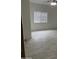 Bedroom with tile floors and natural light at 525 N Miller Rd # 239, Scottsdale, AZ 85257