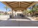 Large, covered cabana with seating, ideal for gatherings and providing shade by the pool at 525 N Miller Rd # 239, Scottsdale, AZ 85257