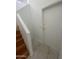 Staircase with wood treads and tile landing at 525 N Miller Rd # 239, Scottsdale, AZ 85257