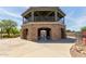 A beautiful brick and wrought-iron gazebo provides a peaceful, shaded gathering space for residents and their guests at 652 E Rojo Way, Gilbert, AZ 85297