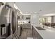 Modern kitchen with stainless steel appliances, an island, and stylish cabinetry at 652 E Rojo Way, Gilbert, AZ 85297