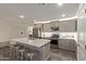 The spacious kitchen features stainless steel appliances, a large island, and plenty of storage space at 652 E Rojo Way, Gilbert, AZ 85297