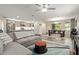 Open-concept living room seamlessly flows into the dining area and kitchen, great for entertaining at 652 E Rojo Way, Gilbert, AZ 85297