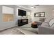 Modern living room with stylish furniture, and plenty of natural light at 652 E Rojo Way, Gilbert, AZ 85297