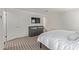 This main bedroom features a dresser with a flatscreen TV and a comfortable bed at 652 E Rojo Way, Gilbert, AZ 85297
