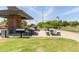 Park with grills, picnic tables and benches, perfect for outdoor dining and gatherings at 652 E Rojo Way, Gilbert, AZ 85297
