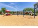 Fun playground featuring slides, swings, and shaded seating areas for relaxation at 652 E Rojo Way, Gilbert, AZ 85297