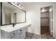 Bathroom featuring a vanity with modern fixtures at 6637 W Watkins St, Phoenix, AZ 85043