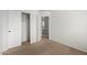 Carpeted bedroom with closet at 6637 W Watkins St, Phoenix, AZ 85043