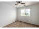Cozy bedroom features neutral carpet and ceiling fan at 6637 W Watkins St, Phoenix, AZ 85043