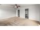 Bright bedroom with carpet floors and an ensuite bath at 6637 W Watkins St, Phoenix, AZ 85043