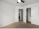 Bedroom features neutral carpet and closet at 6637 W Watkins St, Phoenix, AZ 85043