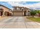 Charming two-story home with a neutral palette, tile roof, and spacious driveway providing ample parking at 6637 W Watkins St, Phoenix, AZ 85043