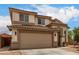 Charming two-story home with a two-car garage and well-manicured front yard at 6637 W Watkins St, Phoenix, AZ 85043
