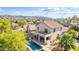 Aerial view showcases backyard oasis, pool, spa, desert landscaping, & mountain views at 6847 S 27Th Pl, Phoenix, AZ 85042