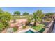 Views of the golf course and putting green elevate this backyard oasis with pool at 6847 S 27Th Pl, Phoenix, AZ 85042