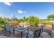 Outdoor balcony features beautiful golf course views, seating area, and peaceful vistas at 6847 S 27Th Pl, Phoenix, AZ 85042