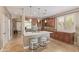 Modern kitchen featuring a center island, quartz countertops, and stainless steel appliances at 6847 S 27Th Pl, Phoenix, AZ 85042