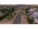 Picturesque aerial view capturing sidewalks in between houses and mountain views at 6971 W El Cortez Pl, Peoria, AZ 85383