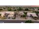 Extensive aerial view of a neighborhood showcasing well-manicured lawns and mature trees at 6971 W El Cortez Pl, Peoria, AZ 85383