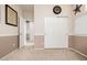 Neutral colored bedroom with tan paint and large sliding door closet at 6971 W El Cortez Pl, Peoria, AZ 85383