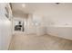 Cozy bonus room with carpet flooring, neutral tones, and ample natural light for a versatile space at 6971 W El Cortez Pl, Peoria, AZ 85383
