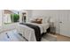 Inviting bedroom bathed in natural light with soft textures, a neutral color palette, and a cozy rug at 732 W Sagebrush St, Gilbert, AZ 85233