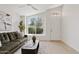 Cozy living room with a large window providing natural light and a view of the outdoors at 732 W Sagebrush St, Gilbert, AZ 85233