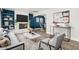 Bright living room featuring a fireplace, floating shelves, and modern decor at 738 S Pomeroy --, Mesa, AZ 85210