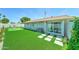 Backyard featuring a synthetic putting green, low-maintenance landscaping, and a desert view at 7524 N Via Del Elemental --, Scottsdale, AZ 85258