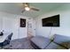 This bonus room boasts a TV, comfortable seating, and plenty of storage at 7524 N Via Del Elemental --, Scottsdale, AZ 85258