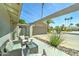 Inviting front porch with outdoor seating area and decorative plants at 7524 N Via Del Elemental --, Scottsdale, AZ 85258