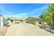 Charming single-story home featuring a circular driveway and xeriscaped front yard at 7524 N Via Del Elemental --, Scottsdale, AZ 85258