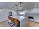 Modern kitchen with a large island, pendant lighting, stainless steel appliances, and ample countertop space at 7524 N Via Del Elemental --, Scottsdale, AZ 85258