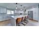 Bright, modern kitchen featuring a large island with seating, stainless steel appliances, and custom cabinetry at 7524 N Via Del Elemental --, Scottsdale, AZ 85258