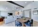 Open-concept living room with a dining area, comfortable seating, and a bright, airy atmosphere at 7524 N Via Del Elemental --, Scottsdale, AZ 85258