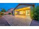 Covered patio with brick floor and desert landscaped backyard at 7606 E Globemallow Ln, Gold Canyon, AZ 85118