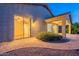 A backyard view features a covered patio and paver patio at 7606 E Globemallow Ln, Gold Canyon, AZ 85118