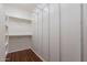 Walk-in closet with shelving and hardwood floors at 7606 E Globemallow Ln, Gold Canyon, AZ 85118