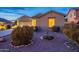 Exterior shows well-kept landscaping and a warm inviting exterior at 7606 E Globemallow Ln, Gold Canyon, AZ 85118