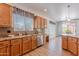 Well-lit kitchen showcasing stainless steel appliances, granite countertops, and ample cabinet space at 7606 E Globemallow Ln, Gold Canyon, AZ 85118