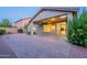 Outdoor space with covered patio and brick pavers, perfect for entertaining and relaxation at 7606 E Globemallow Ln, Gold Canyon, AZ 85118