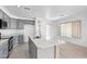 Modern kitchen equipped with granite countertops and stainless steel appliances at 7767 W Sierra Vista Dr, Glendale, AZ 85303