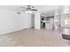 Open-concept living area showing access to the kitchen and tile flooring at 7767 W Sierra Vista Dr, Glendale, AZ 85303