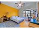 Comfortable bedroom with a ceiling fan, a bay window, and stylish furniture at 8111 W Wacker Rd # 62, Peoria, AZ 85381