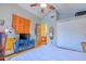 Spacious bedroom with a ceiling fan, closet space, and a door to another room at 8111 W Wacker Rd # 62, Peoria, AZ 85381